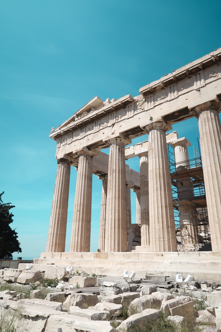 Close-up of the Parthenon with a bright sky.