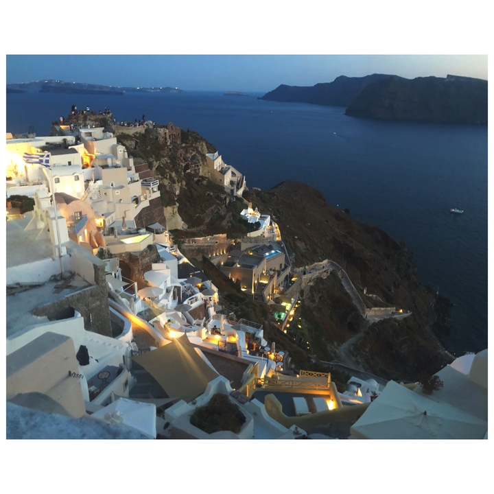 Aerial view of a coastal town at dusk.