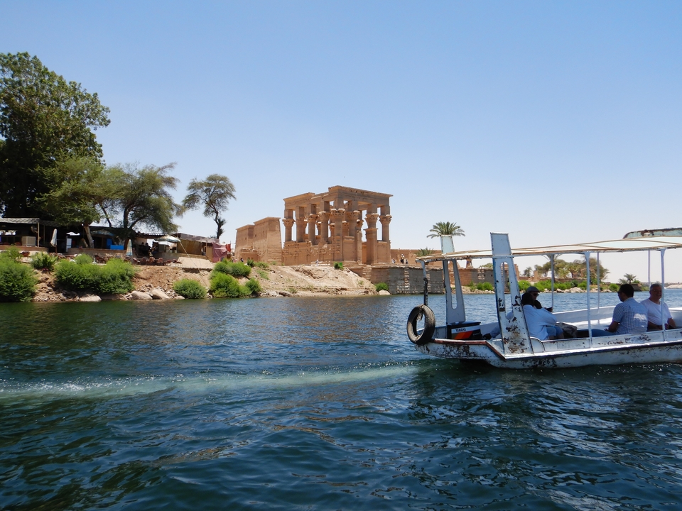 Boats on the Nile with the Temple of Philae in the background.