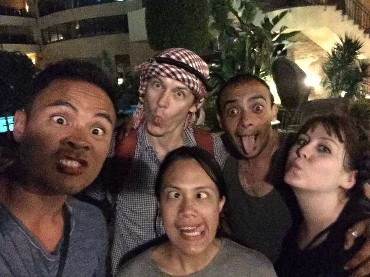 Group picture with people posing humorously.