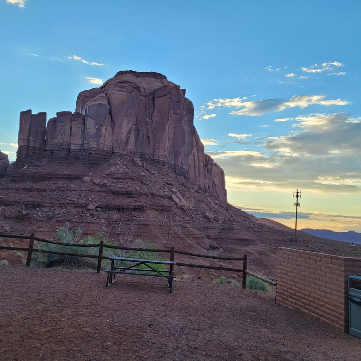 Iconic bluff at Monument Valley during a dynamic sky.