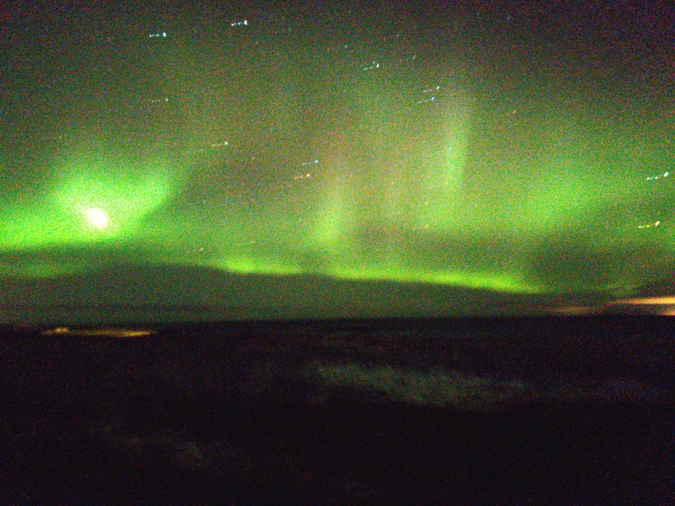 Northern lights illuminating the night sky.