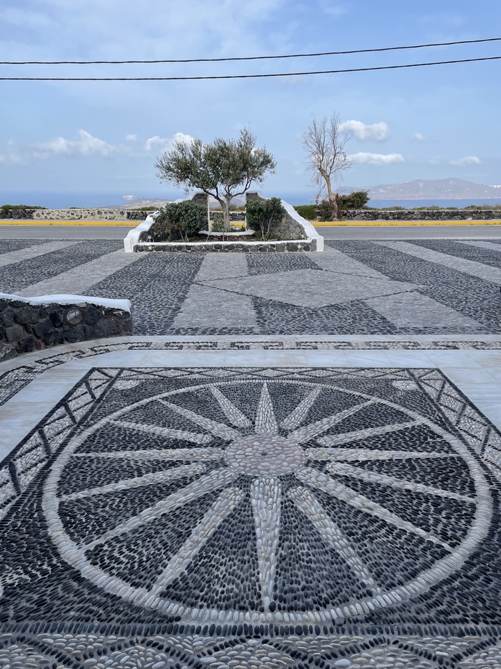 Dallage en mosaïque de pierre complexe en Grèce.