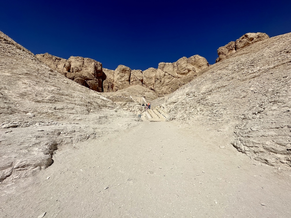 Stairway amidst rugged cliffs.
