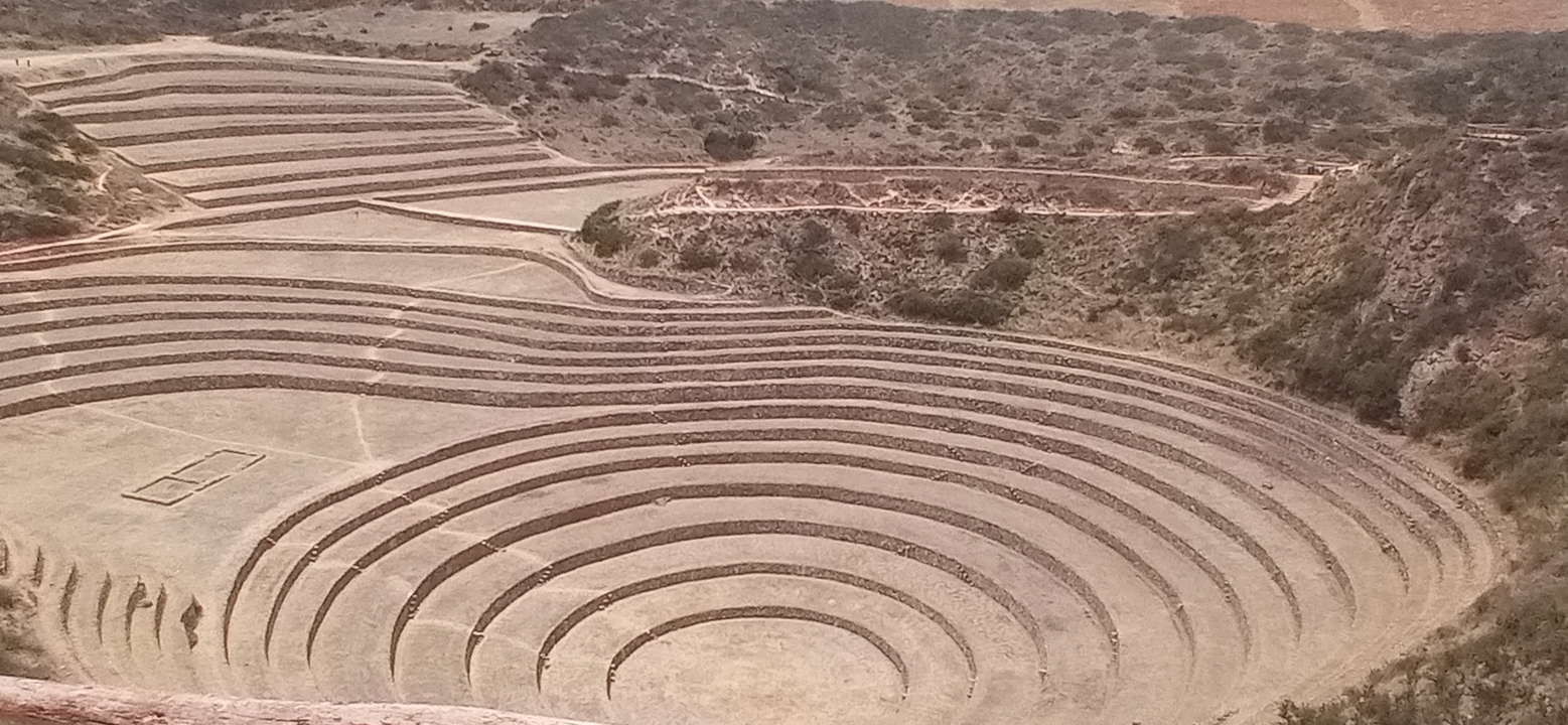 Terraced circular formations in a dry landscape.