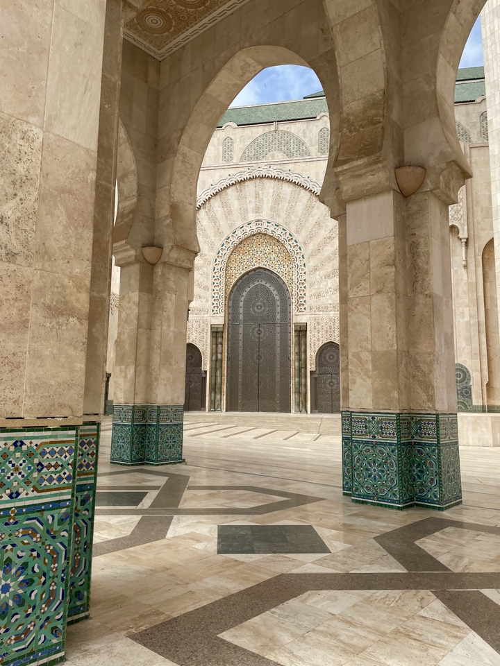 Elegant architecture with ornate tiling and arches.