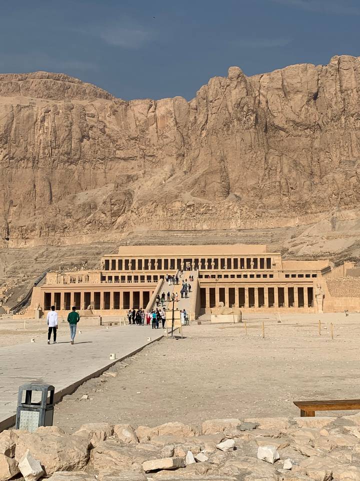 A large temple complex with visitors.