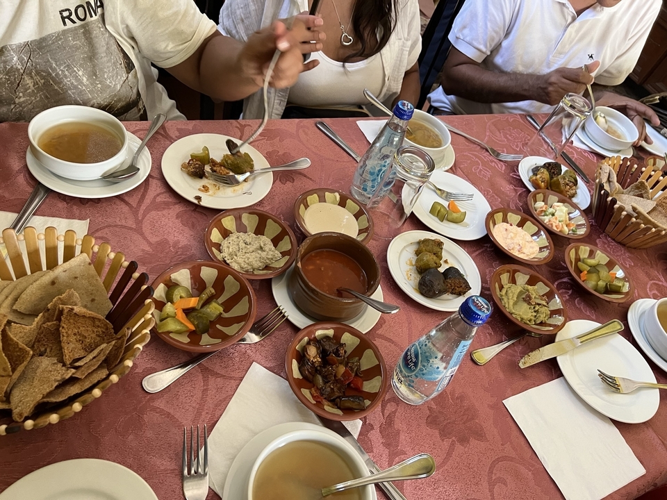 A lavish spread of Egyptian food on a table.