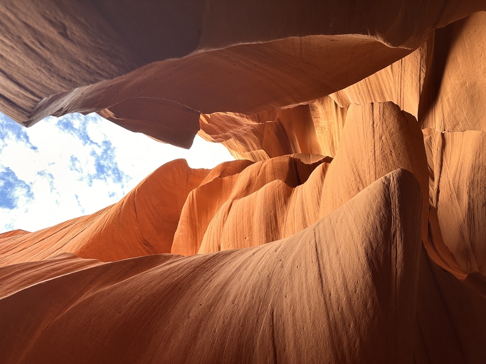Red rock formations with sky in upper portion