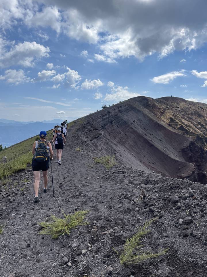 Hikers on a rugged mountain terrain