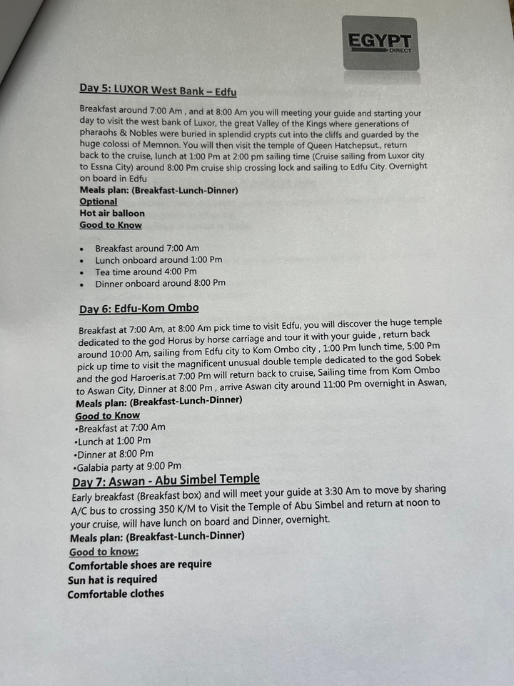 Close-up photo of itinerary text for Edfu and Kom Ombo day tour on white paper