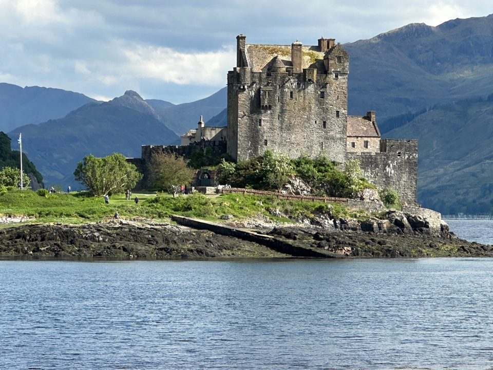 Eilean Donan Castle by a lake.