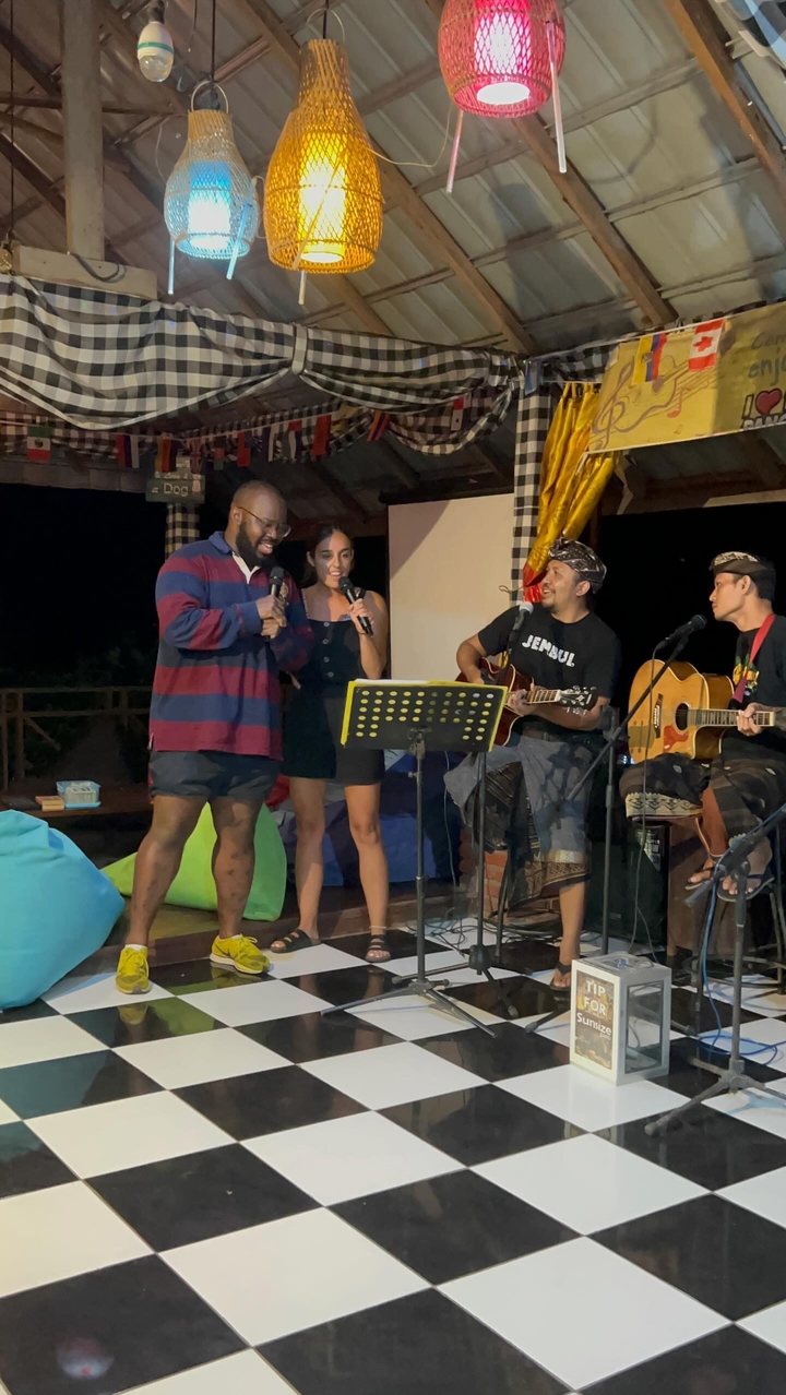 People enjoying live music in an outdoor setting.