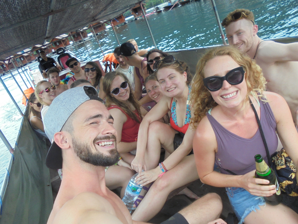 People on a boat ride on a sunny day.