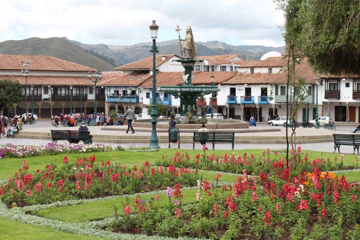 Fountain and flower gardens in a town square