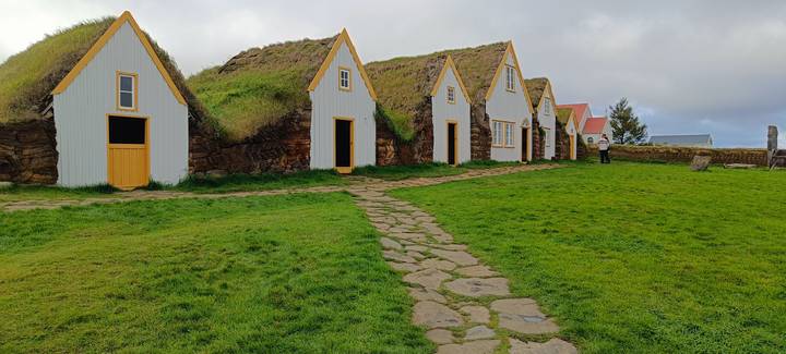 Traditional turf houses with grass roofs.