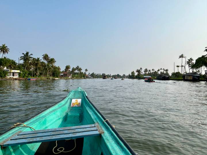 A boat on the river in a tropical landscape.