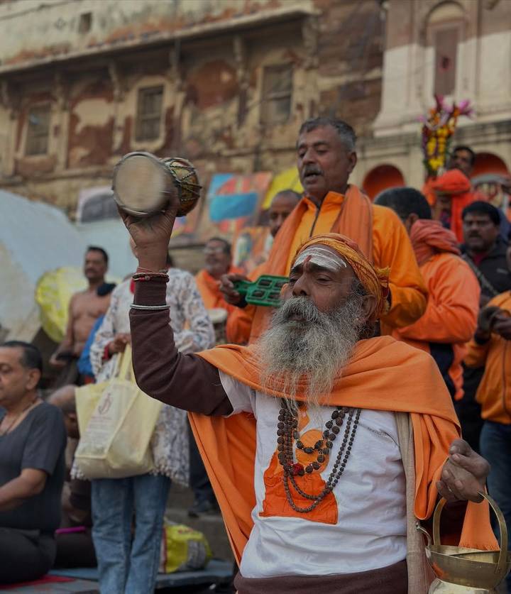 Hindu priest performing a ritual on the ghats in Varanasi.