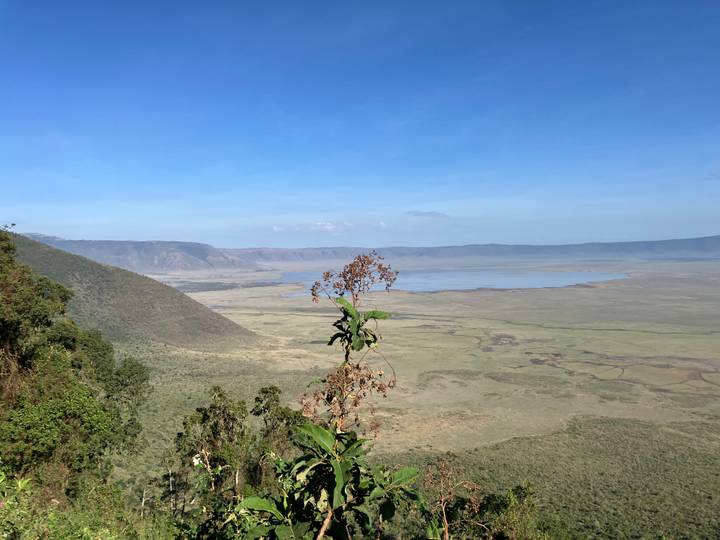 Vast view of a crater landscape with a lake.
