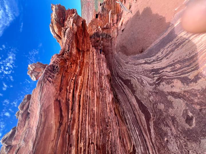 Red rock formations with clear blue sky.