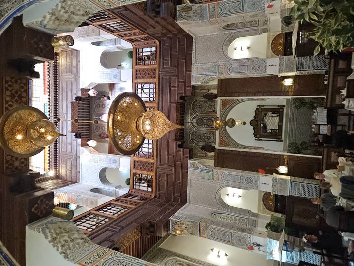 Interior of a Moroccan riad with intricate designs.