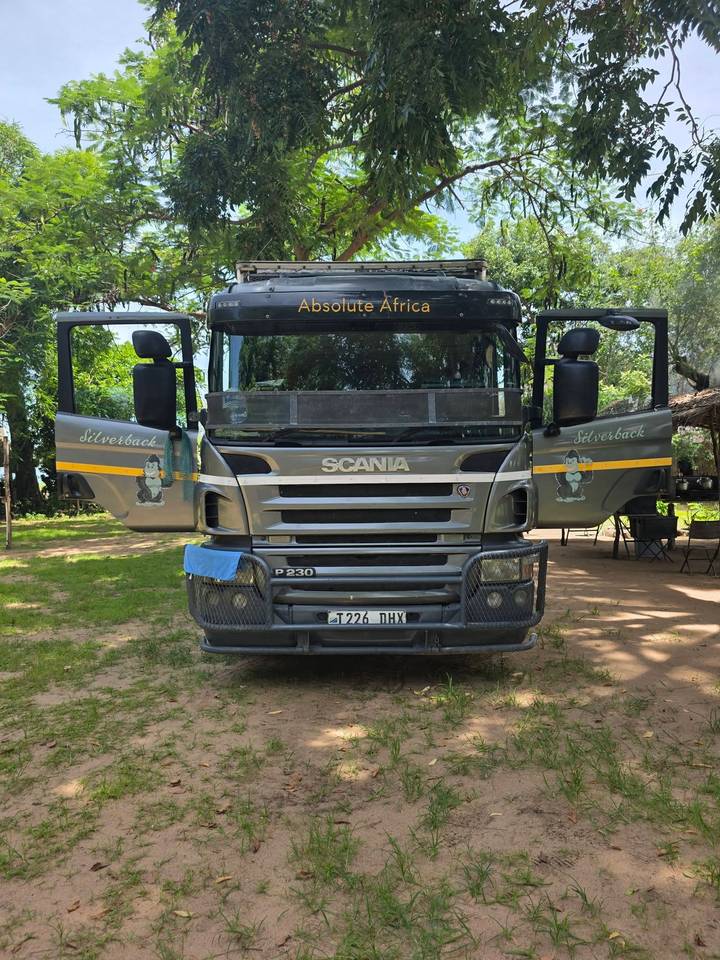 Front view of a rugged Absolute Africa Scania overland truck named Silverback.
