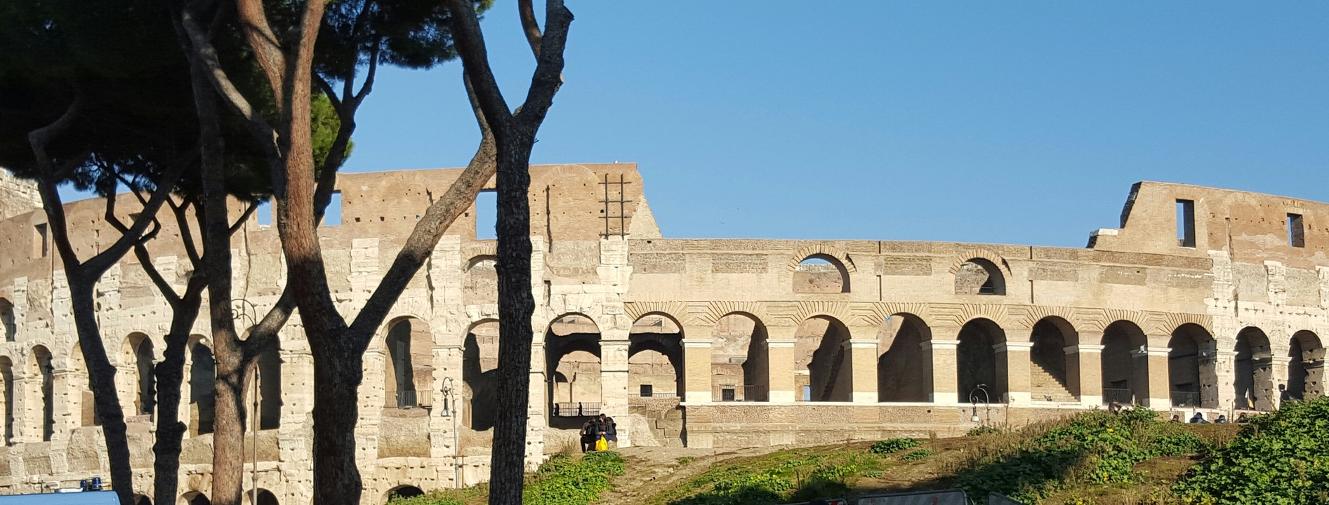 The Colosseum in Rome on a sunny day.