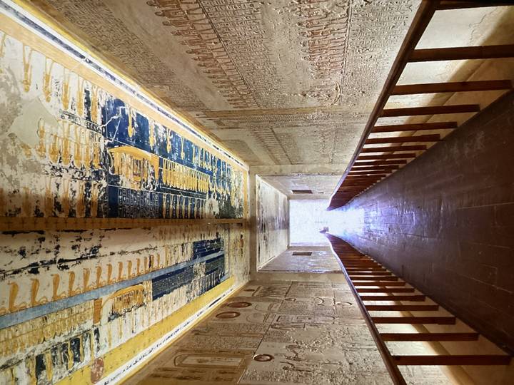 Richly painted corridor and ceiling of an ancient tomb in the Valley of the Kings.