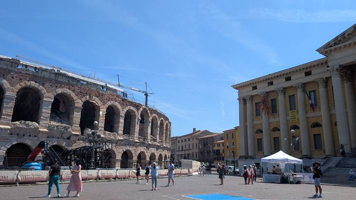 Open square with Verona Arena undergoing works opposite neoclassical palace