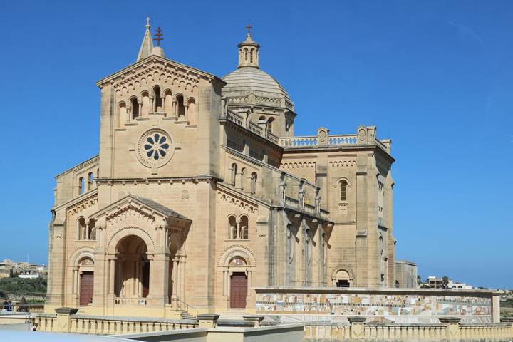 Isolated Ta' Pinu Basilica on Gozo under deep blue sky