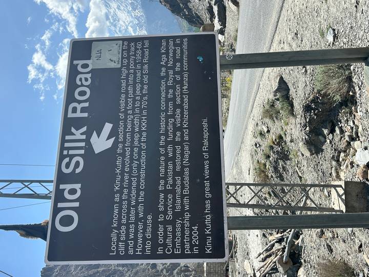 Informational roadside sign titled "Old Silk Road" describing historical context.
