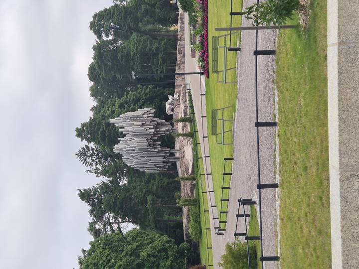 Sibelius Monument of stylised metal pipes set in Helsinki park.