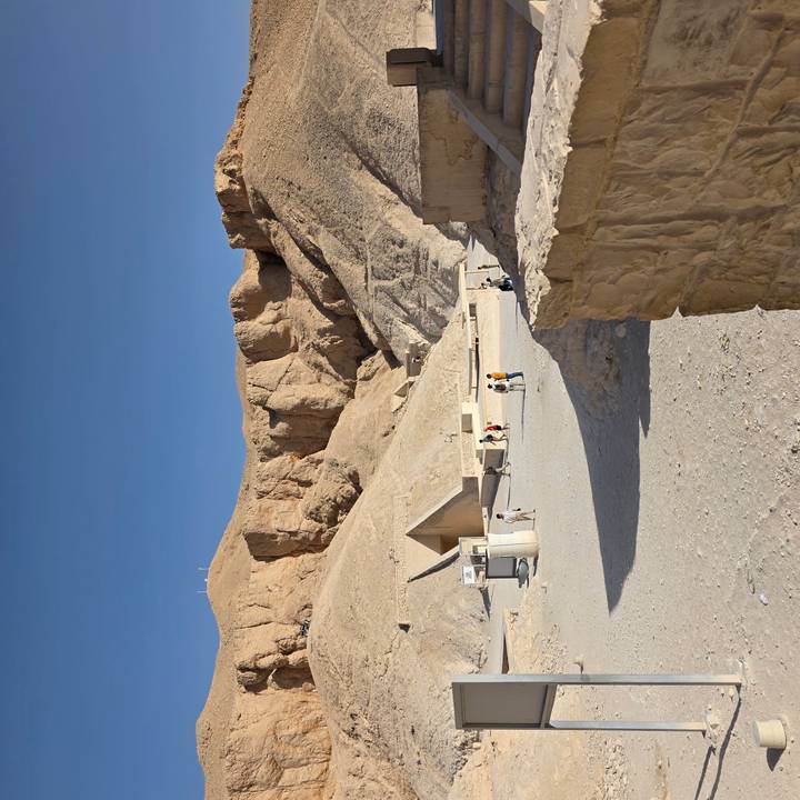 Dusty valley landscape with modern entrance buildings at the Valley of the Kings