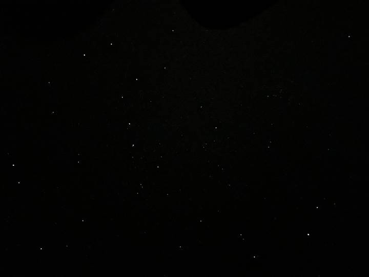Black sky filled with scattered bright stars captured on a clear desert night