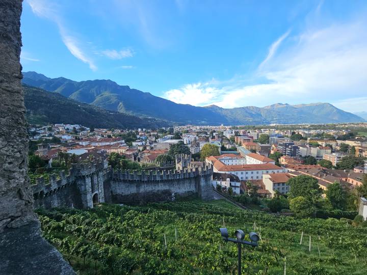 Panoramic view from a castle over Bellinzona’s medieval walls to the surrounding town and mountains