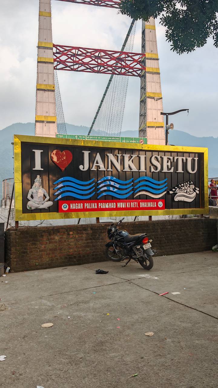 Colourful roadside sign proclaiming 'I ♥ Janki Setu' with river graphics and Hindi text