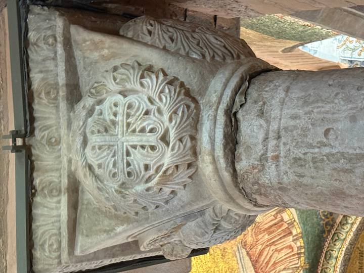 Detailed carving on a marble column capital inside Hagia Sophia