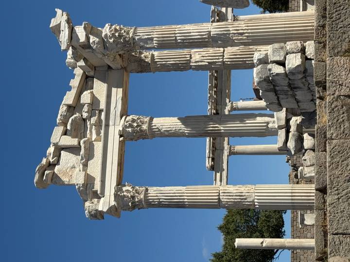 Ruins of classical columns and entablature at Pergamum under clear sky