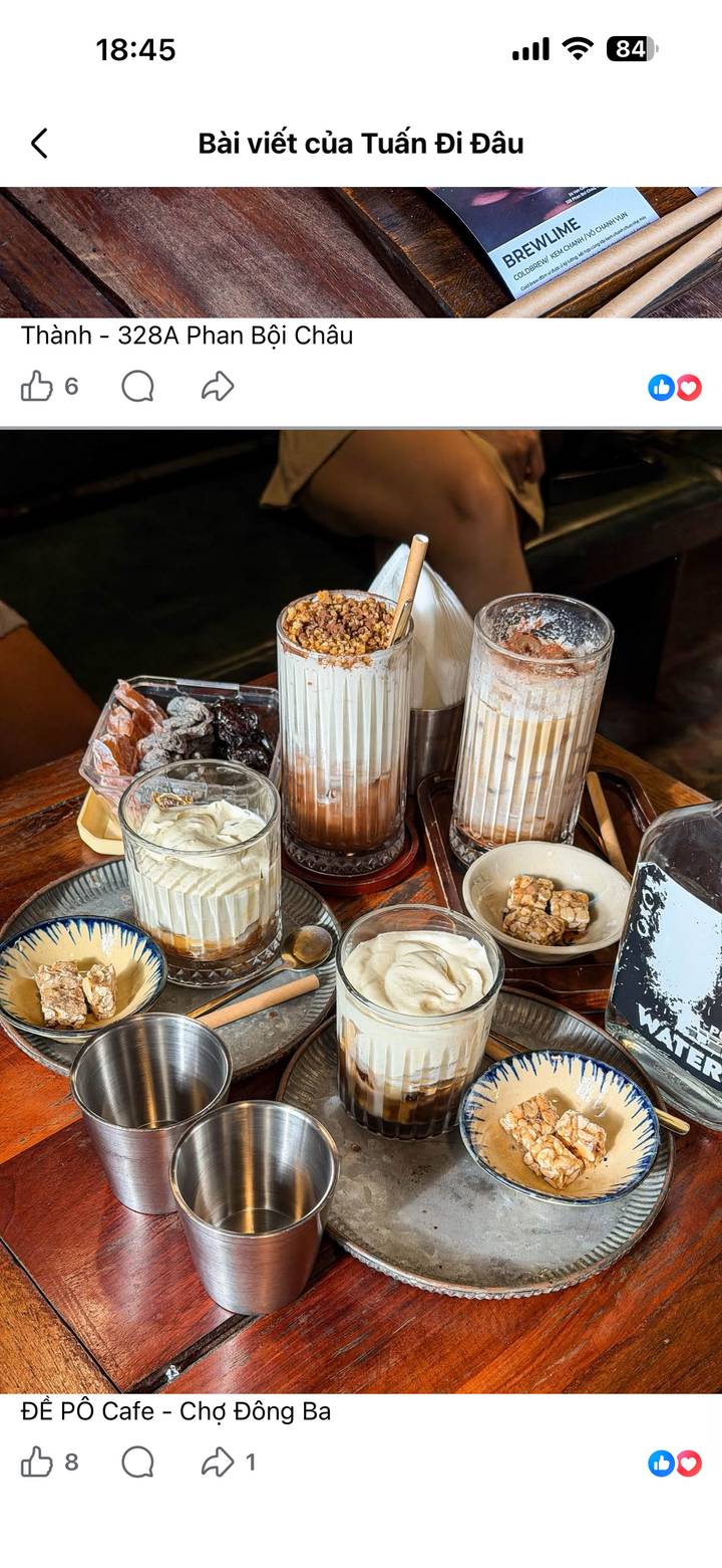 Selection of creamy Vietnamese egg coffees and desserts served in tall ribbed glasses.