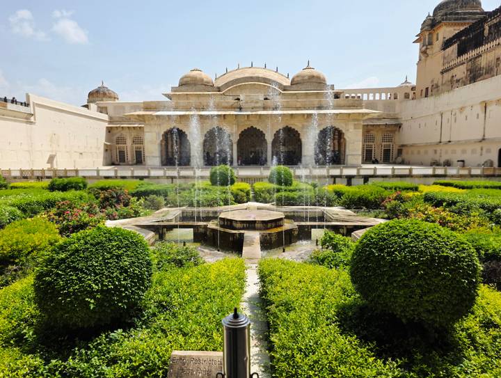Symmetrical Mughal garden with central fountains inside the Amber Fort complex