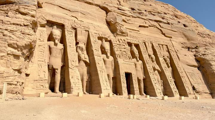 The rock-cut Temple of Hathor at Abu Simbel stands carved into a cliff face.