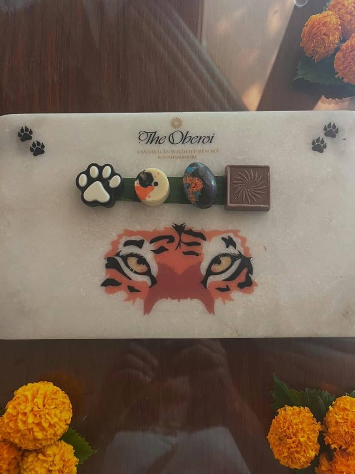 Decorative plate with assorted chocolates themed after tiger conservation resort