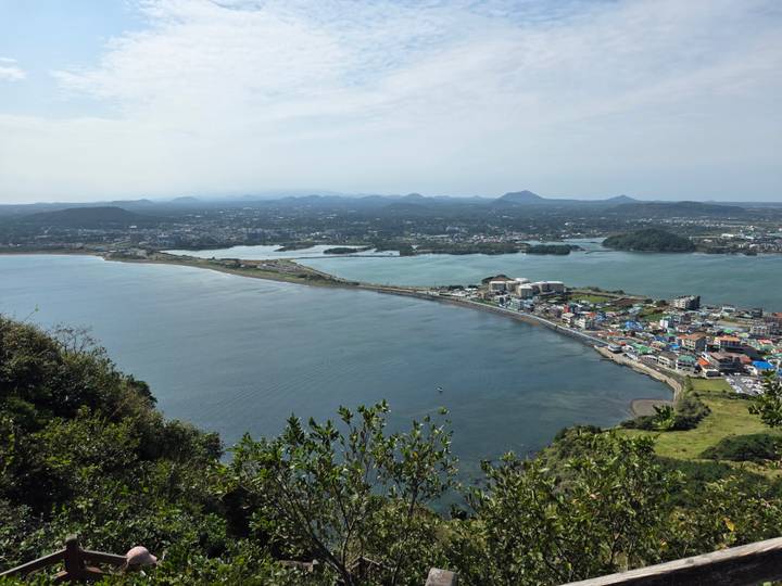 Panoramic coastal view of Jeju city and peninsulas from a high lookout