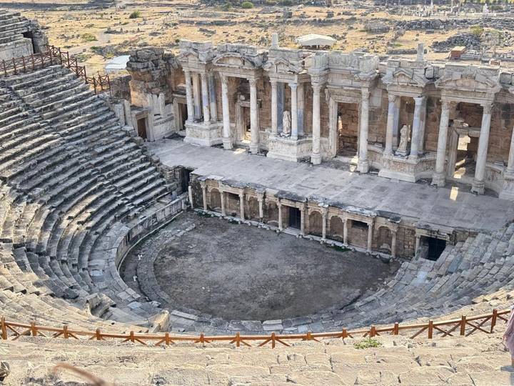 Top-down view of the stone stage and orchestra pit of the Hierapolis theater.