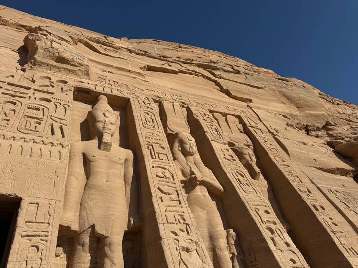 Carved rock façade with standing figures at the Small Temple of Abu Simbel
