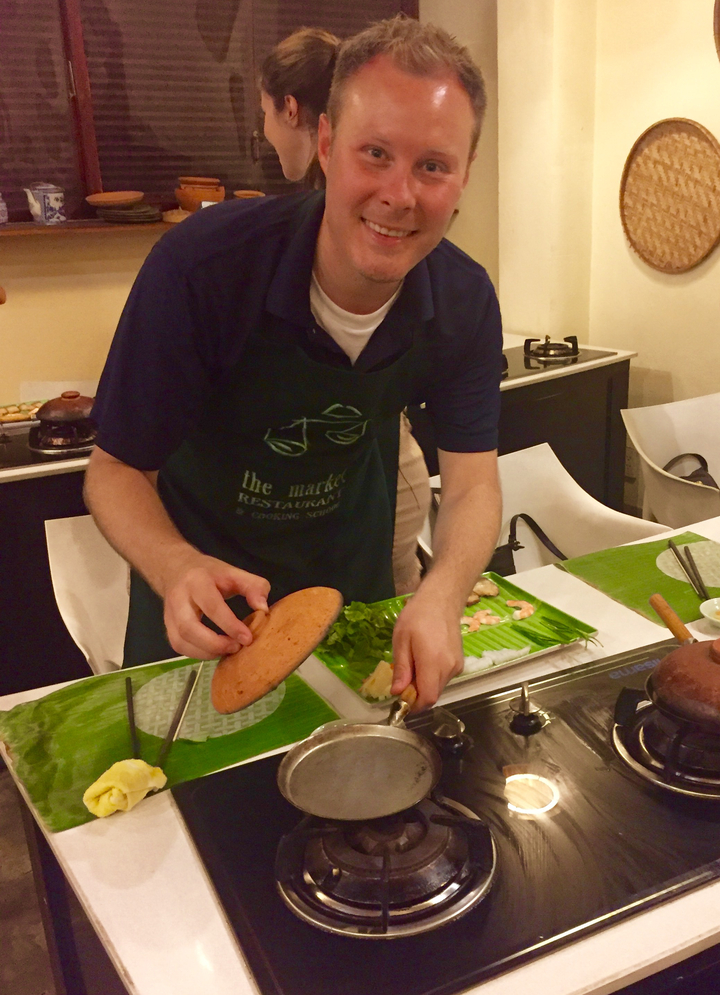 Personne participant à un cours de cuisine.