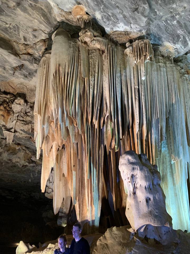 Stalactites and stalagmites in a cave.