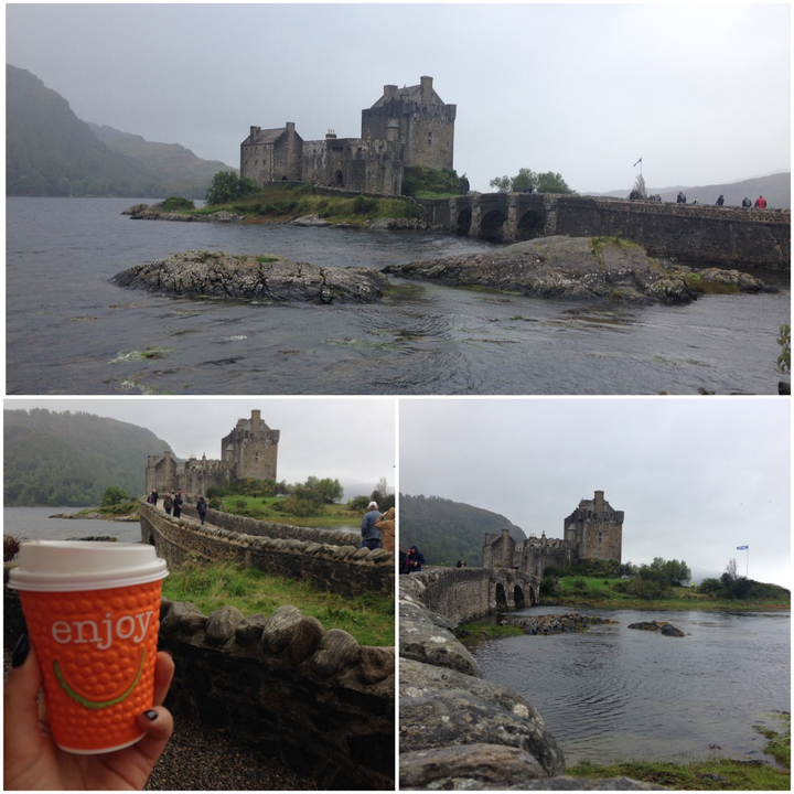 Eilean Donan Castle with people walking over a bridge.