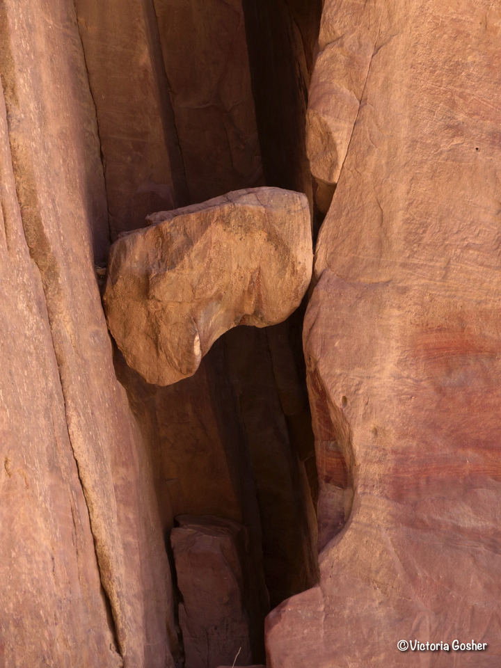 Rock formations close-up with contrasting shadows.