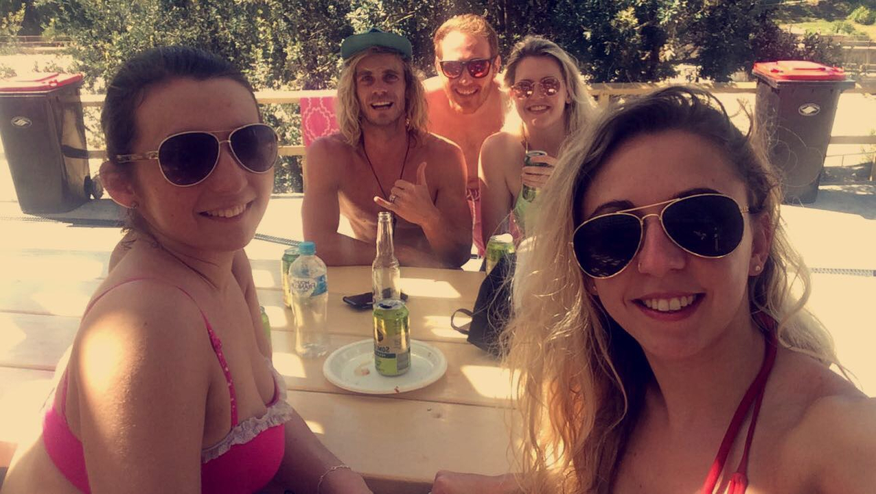 Group of friends having drinks at a bar